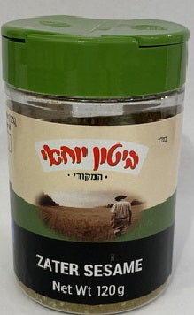 A jar of Biton Yohai Zaatar with a green lid and a label displaying the product name and weight, placed on a beige background.
